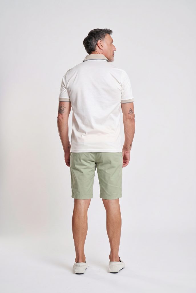 Firefly_Gemini Flash_put the peach shorts in the colour of the green shorts. 478073